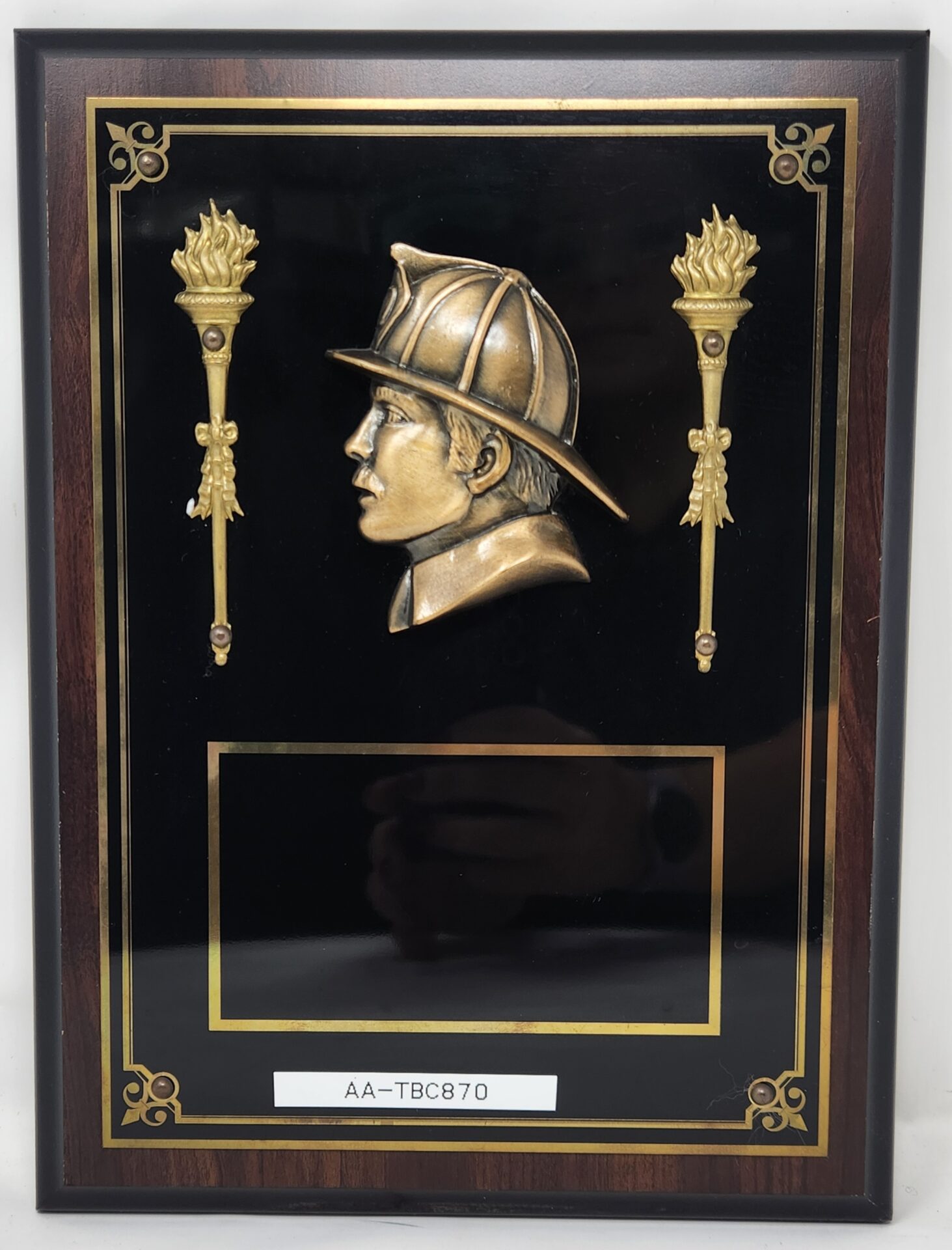 BC870 - Bronze Relief of a Firemans Head.