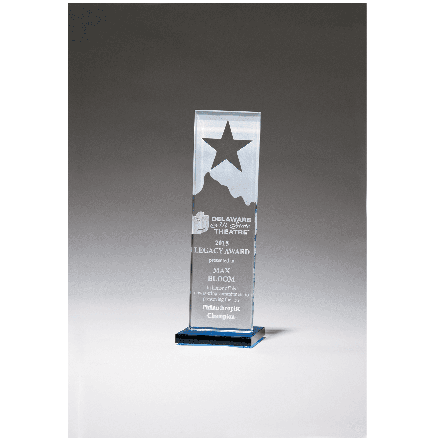 Star and Mountain Peak on Blue Glass Base.